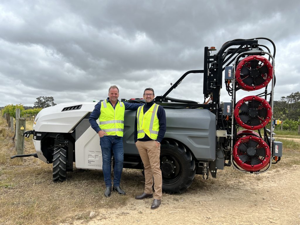 Steve Saunders, Co-founder and Chief Executive, Robotics Plus (left) and Sean Mulvaney, General Manager, Croplands (right) together with Prospr in South Australia